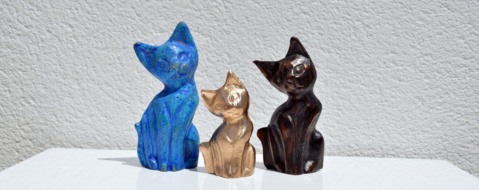 3 chats en bronze - Patines originales - Magali Willems